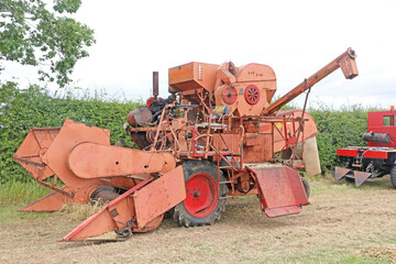 Vintage Combine Harvester in a field
