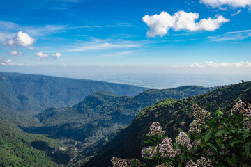 Obraz premium mountain range with bright blue sky at afternoon from flat angle