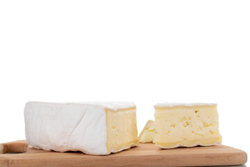 Three fragrant pieces of brie cheese on a wooden board, close-up, isolated on white.