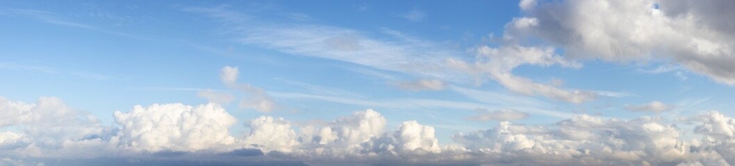 Panoramic View of Cloudscape during a cloudy blue sky sunny day. Taken on the West Coast of British Columbia, Canada.