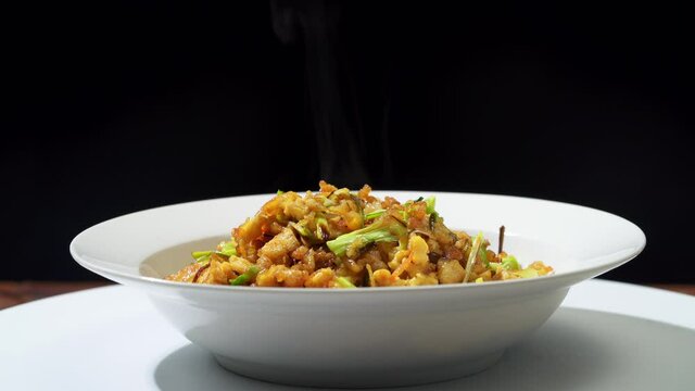 Chinese style home-cooked stir-fry with garlic sprouts and scrambled eggs