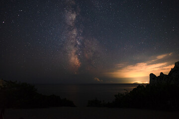 The Milky Way in the starry sky over the sea