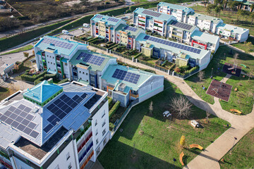 Modern houses with solar panels on the roof for alternative energy. Grugliasco, Italy - November...