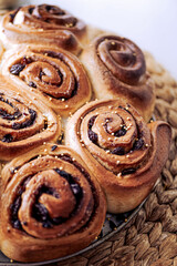Homemade cinnamon rolls made from yeast dough, Chelsea rolls with cinnamon and raisins. Homemade snail buns 