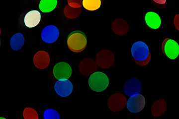 Abstract colorful bokeh lights background, blurred christmas lights for holiday decoration