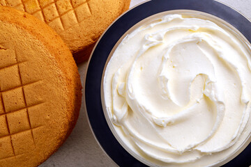 Textured soft egg cake with whipped cream.