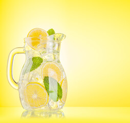 Lemonade pitcher with lemon