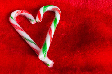 Love is in the air with candy cane hearts. 