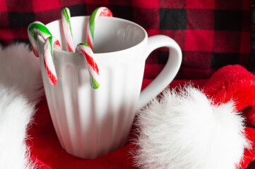 Wrapped up in Red, drinking a warm cup of peppermint candy. 
