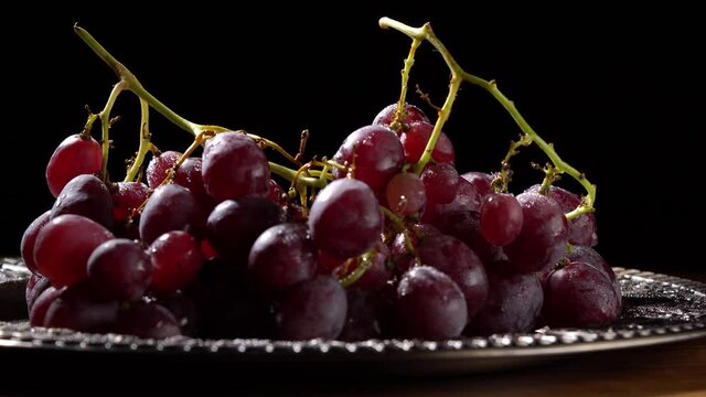Red grapes with water drops close up
