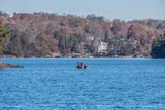 Men In A Boat Duck Hunting