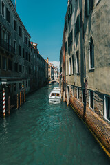 Fototapeta na wymiar Venice streets with canals and boats