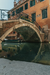 Fototapeta na wymiar Venice streets with canals and boats