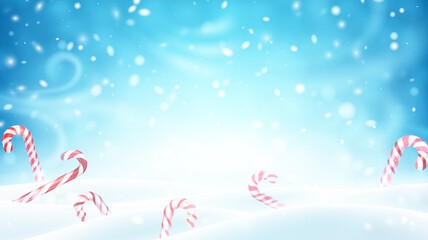 Fototapeta na wymiar Christmas candy canes on snowy background.
