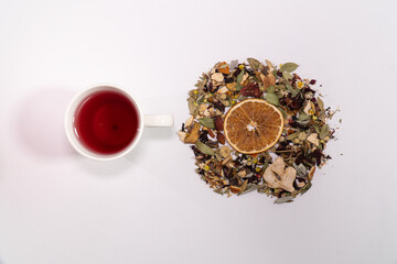 Obraz na płótnie Canvas Winter tea with dried fruits and dried orange, concept idea photo, top view