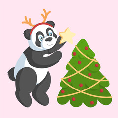 Cute panda with antlers decorates the Christmas tree with a star. Holiday concept.