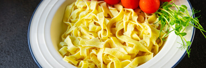 fettuccine or tagliatelle pasta macaroni meal snack on the table copy space food background rustic