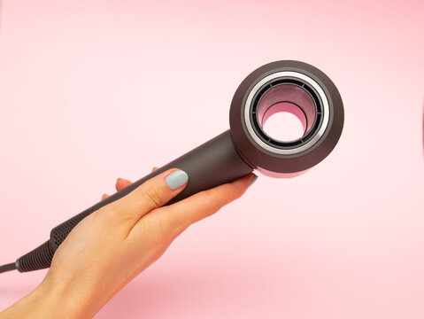 Dyson Supersonic hair dryer attachments in use haircare fuchsia/nickel 