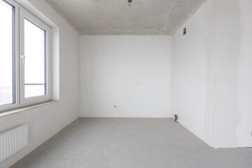 interior of the apartment without decoration in gray colors