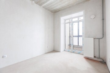 Fototapeta premium interior of the apartment without decoration in gray colors