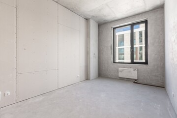 interior of the apartment without decoration in gray colors