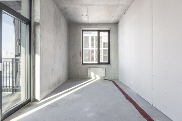 interior of the apartment without decoration in gray colors