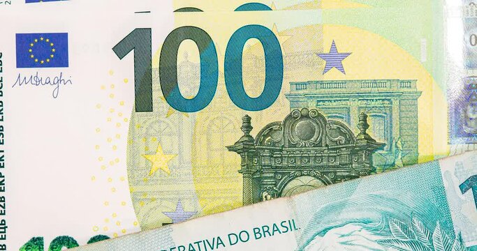 Hundred dollars, euros and brazilian reals bills