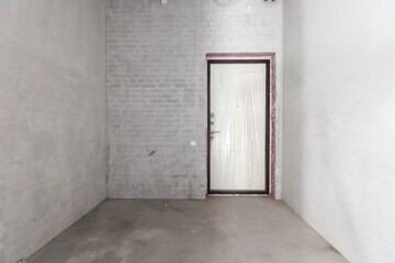 interior of the apartment without decoration in gray colors