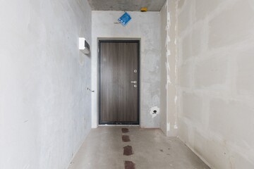 interior of the apartment without decoration in gray colors