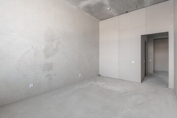 interior of the apartment without decoration in gray colors