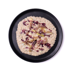 risotto dish with caramelized onions and gorgonzola cheese isolated white background