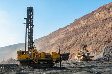 drilling rig at industrial area of iron ore quarry