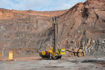 drilling rig at industrial area of iron ore quarry
