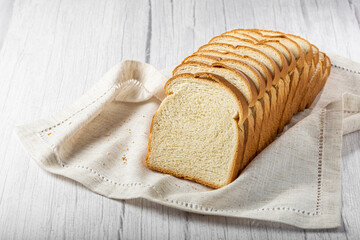 Sliced bread loaf on the table.