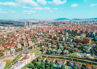 Istanbul downtown aerial drone panorama view at day time. Urban city life under beautiful sky.