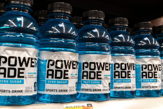 Powerade sports drink display. Powerade replenishes vitamins and electrolytes lost during physical activities and is a division of Coca-Cola.