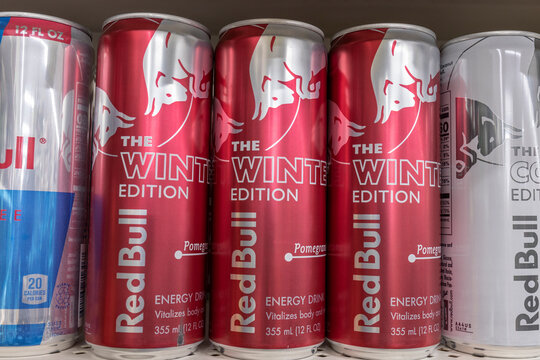 Red Bull Energy Drink display. Red Bull makes over 20 types of energy drinks with caffeine, taurine, and B vitamins.