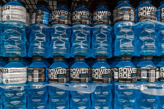 Powerade sports drink display. Powerade replenishes vitamins and electrolytes lost during physical activities and is a division of Coca-Cola.