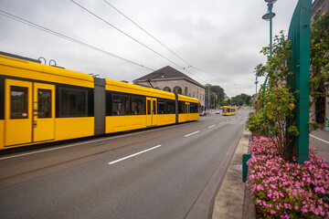 Fototapeta na wymiar tram in motion in the city streets, blurred