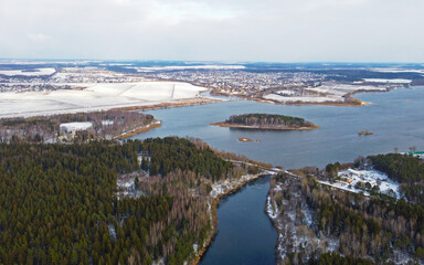 Fototapeta na wymiar Aerial view of the forest lake. Landscape nature in winter