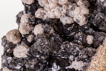 Macro stone groutite mineral on white background