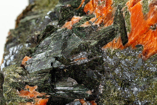 Macro stone mineral Diopside Calcite Magnetite on a white background