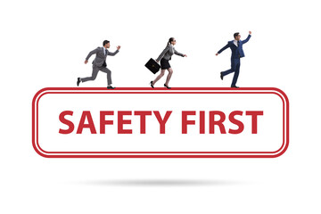Safety first badge with business people