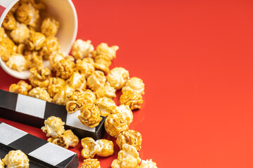 Sweet caramel popcorn and clapper board