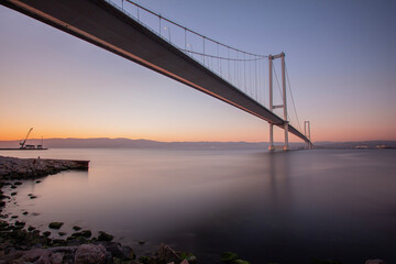 Magnificent sunrise from under Osman Gazi Bridge , Turkey