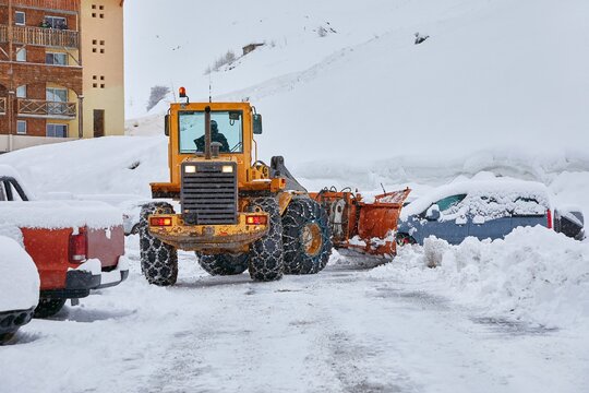 Winter road clearing snowplow