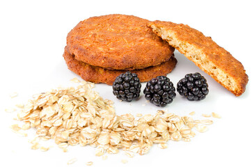 Sweet homemade cookie with oat flakes on white background
