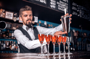 Bartender concocts a cocktail on the porterhouse