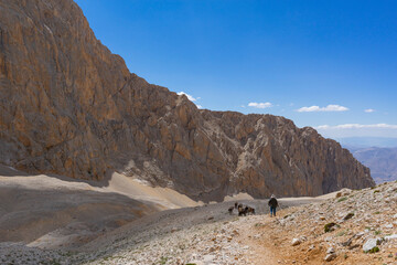 People traveling in Aladaglar. Aladağlar and Yedigöller regions where important mountaineering...