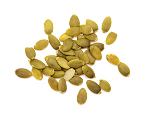 Hulled pumpkin seeds isolated on white background
